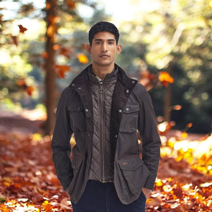 Barbour Ogston wax jacket in dark brown with corduroy-style collar and zip front
