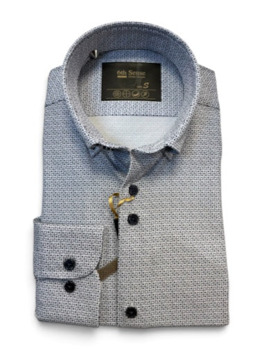 Navy print button-up shirt close-up with pointed collar and dark button placket