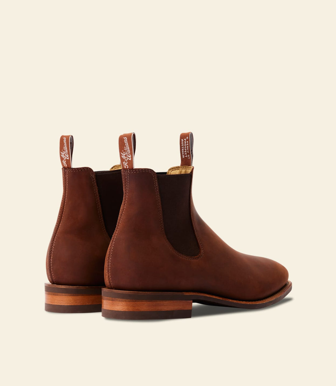 Pair of brown Chelsea boots with elastic side gussets and wooden-look heels
