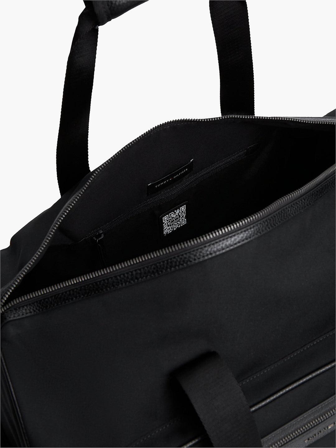 Black duffle bag interior with zip pocket and top handles, TOMMY HILFIGER label