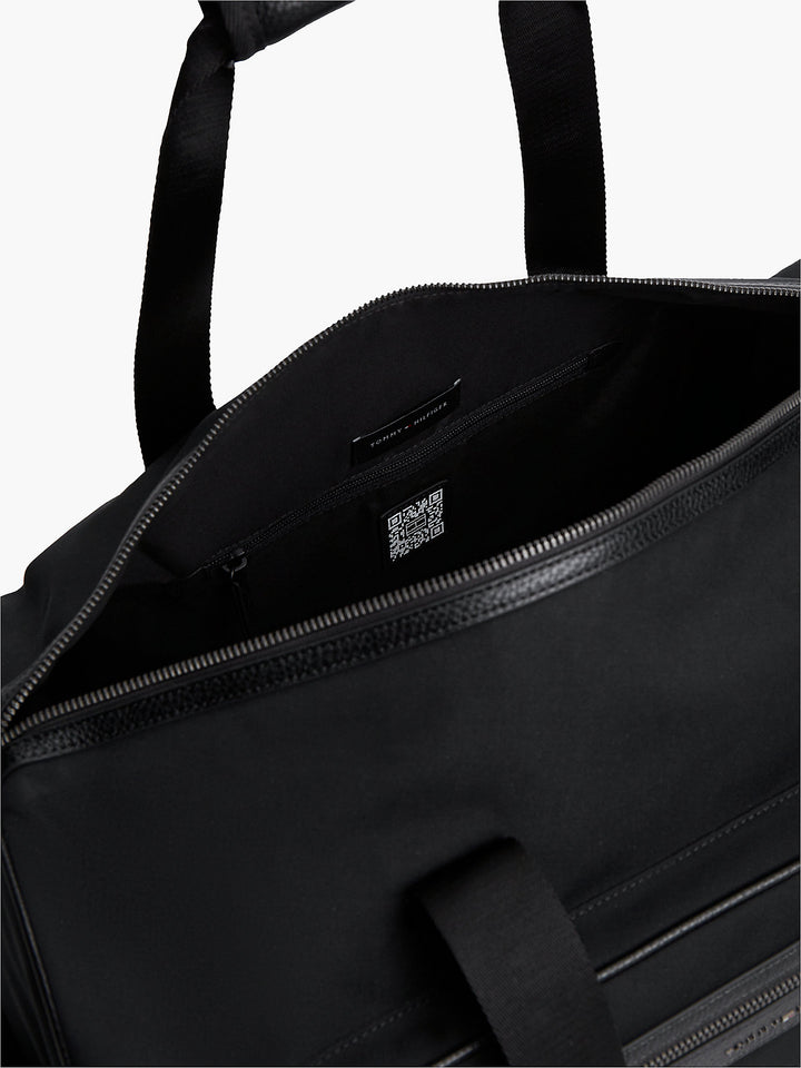 Black duffle bag interior with zip pocket and top handles, TOMMY HILFIGER label