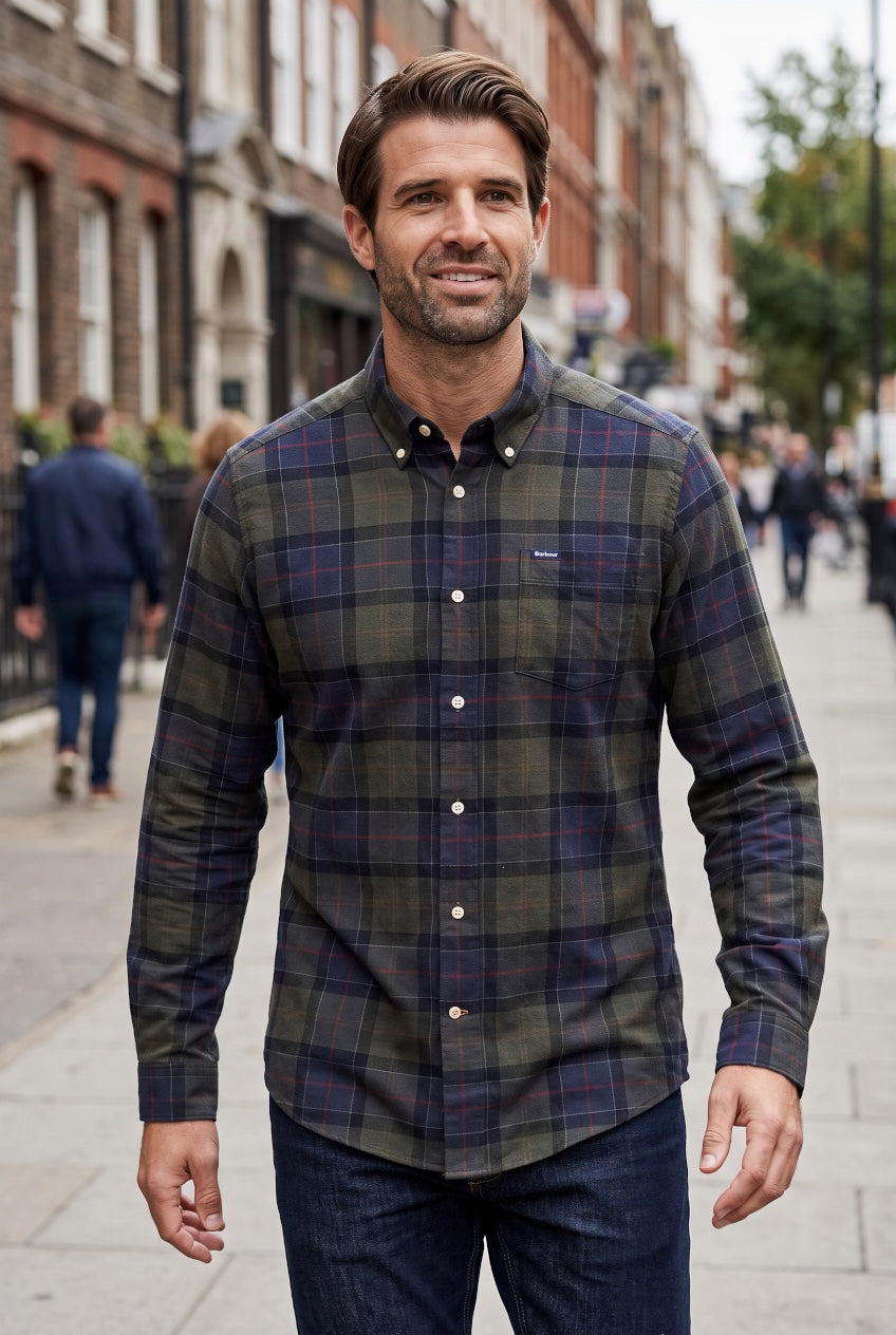 Men's tailored plaid button-up shirt with long sleeves, dark tones, chest logo