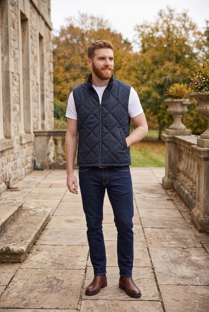 Barbour navy quilted winter gilet, full front zip, worn over white T-shirt