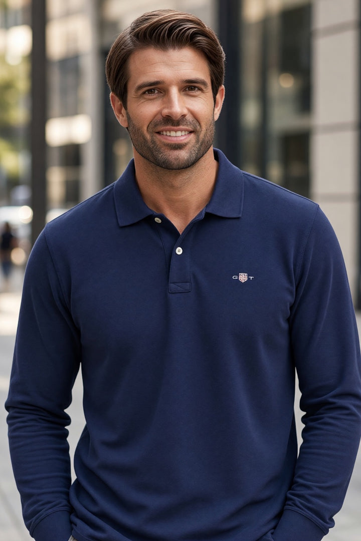 GANT navy long-sleeve polo shirt with button placket and chest logo