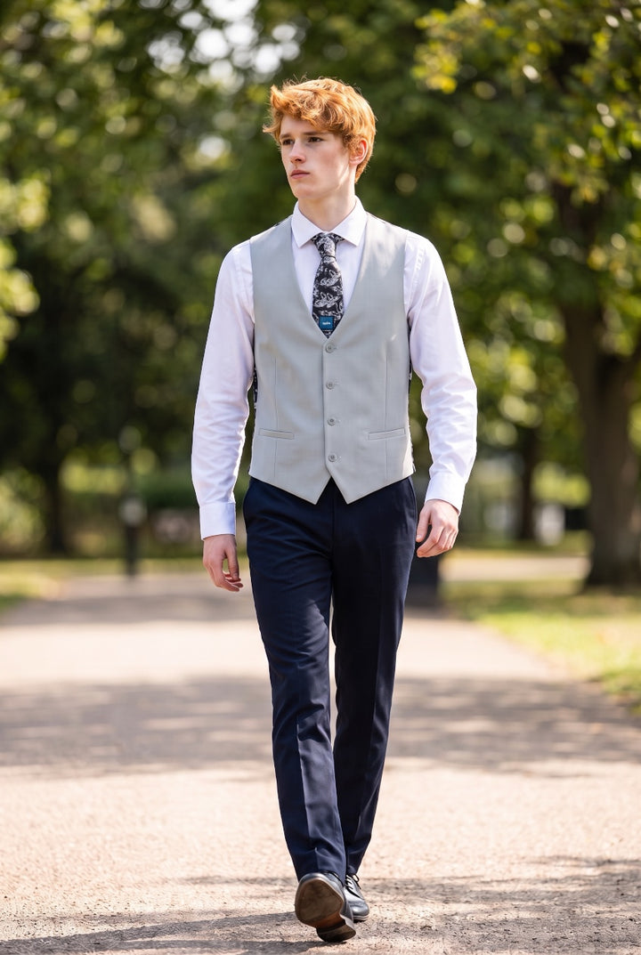 Grey waistcoat vest with five-button front and notch lapels, worn with dress shirt