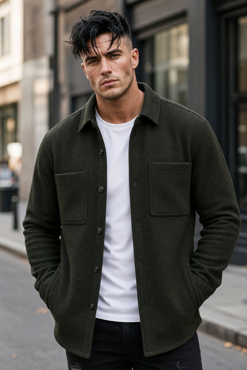 Barbour tailored overshirt dark green with two chest pockets, worn over white tee