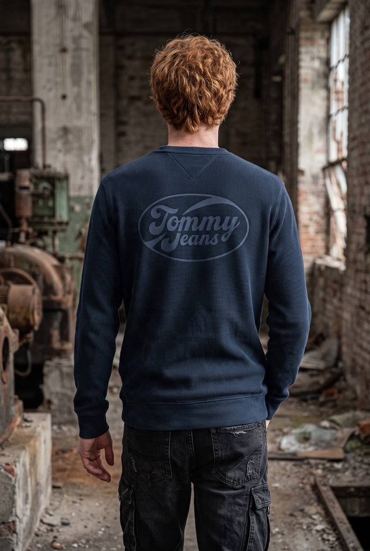 Tommy Jeans navy waffle-knit top with a large logo across the back.