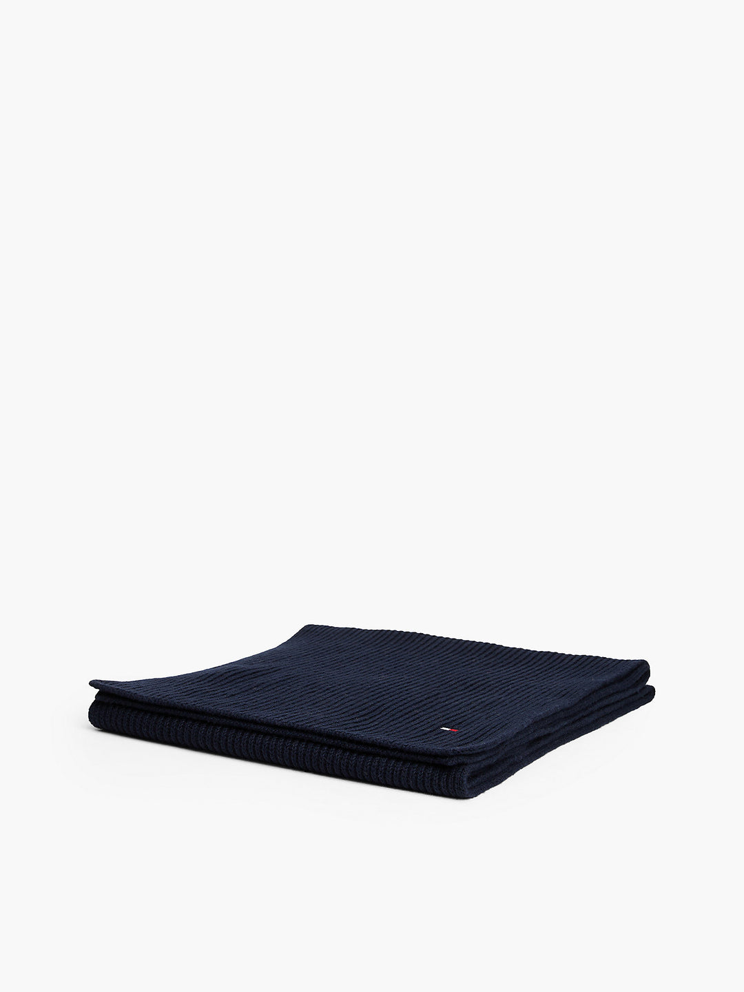 Folded navy knit cotton scarf with small flag logo