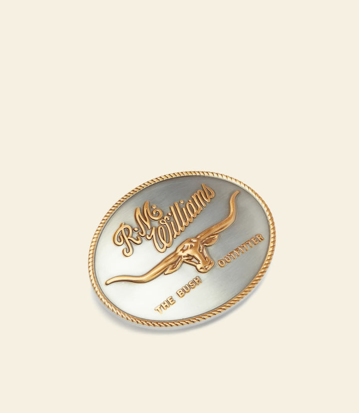 R.M. Williams gold logo buckle, oval horse emblem with engraved text