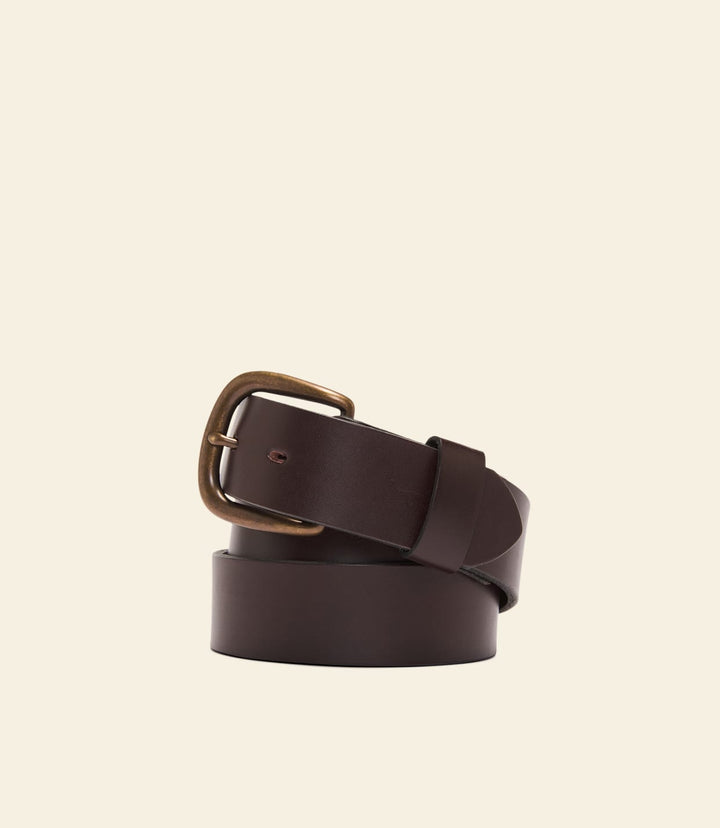 Brown leather belt with brass buckle and single strap keeper.