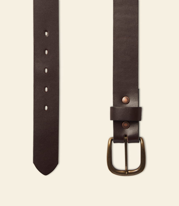 Brown leather belt end with stitch holes and round metal buckle.