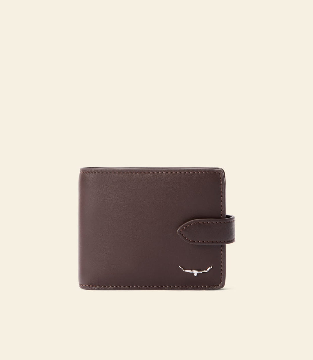 Chestnut leather bifold wallet with strap closure and small logo patch