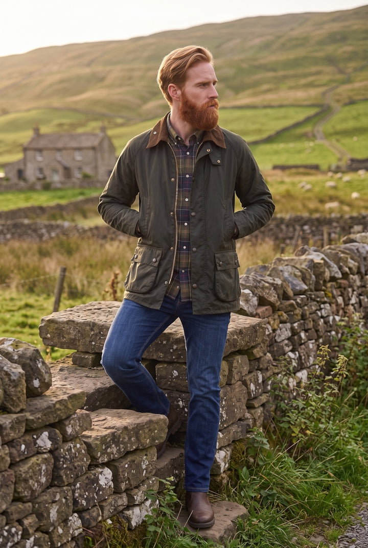 Wax jacket with brown cord collar, dark olive fabric, snap pockets and button placket