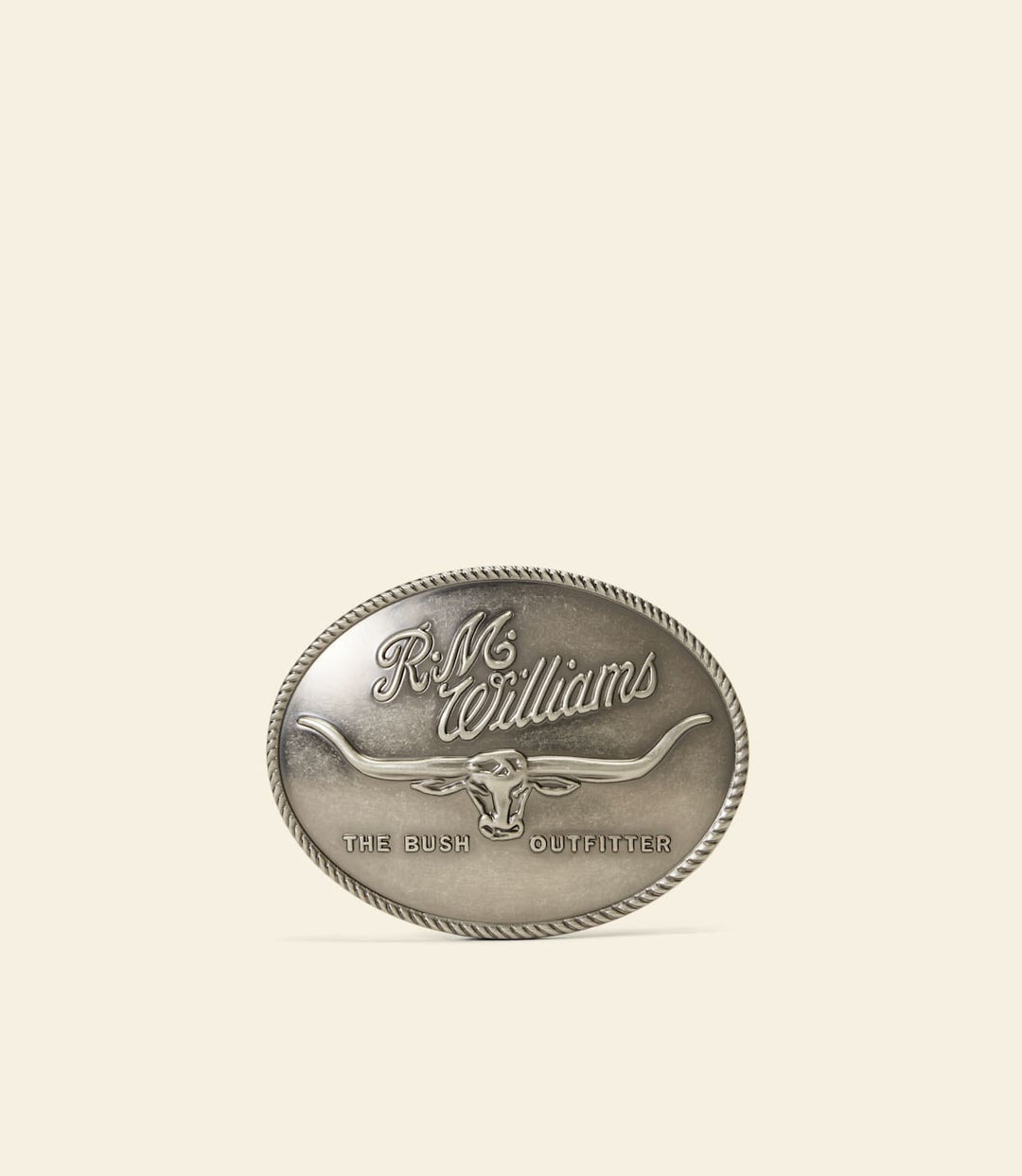 Silver circular RM Williams logo buckle with &