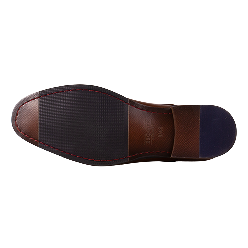 Brown shoe outsole and heel with textured tread and red trim