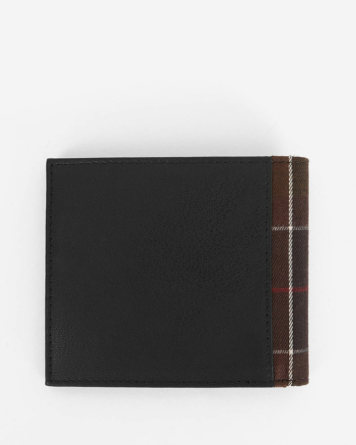 Black leather card holder with visible tartan fabric panel on side
