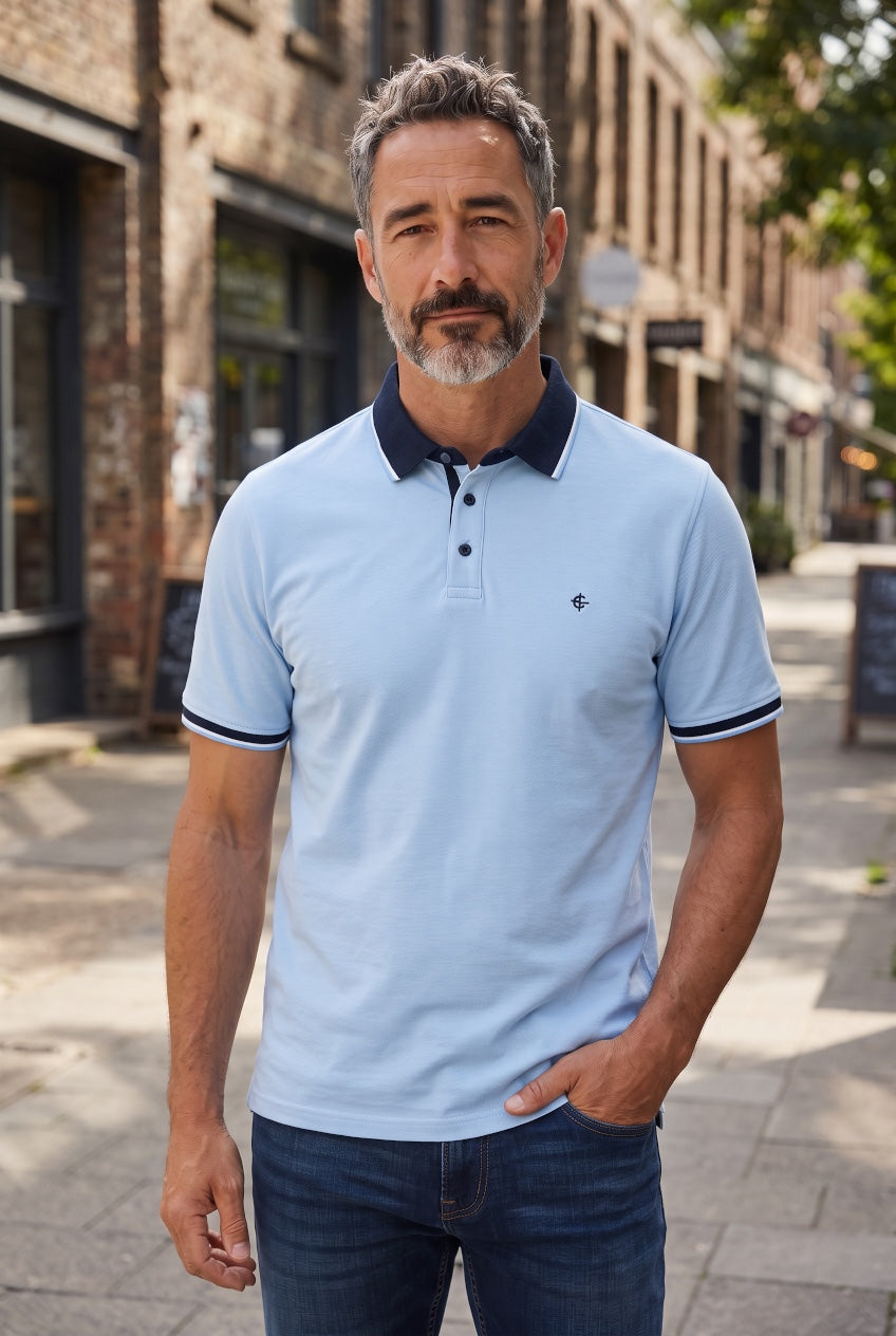Light blue short-sleeve polo shirt with navy collar and button placket, Casa Moda logo