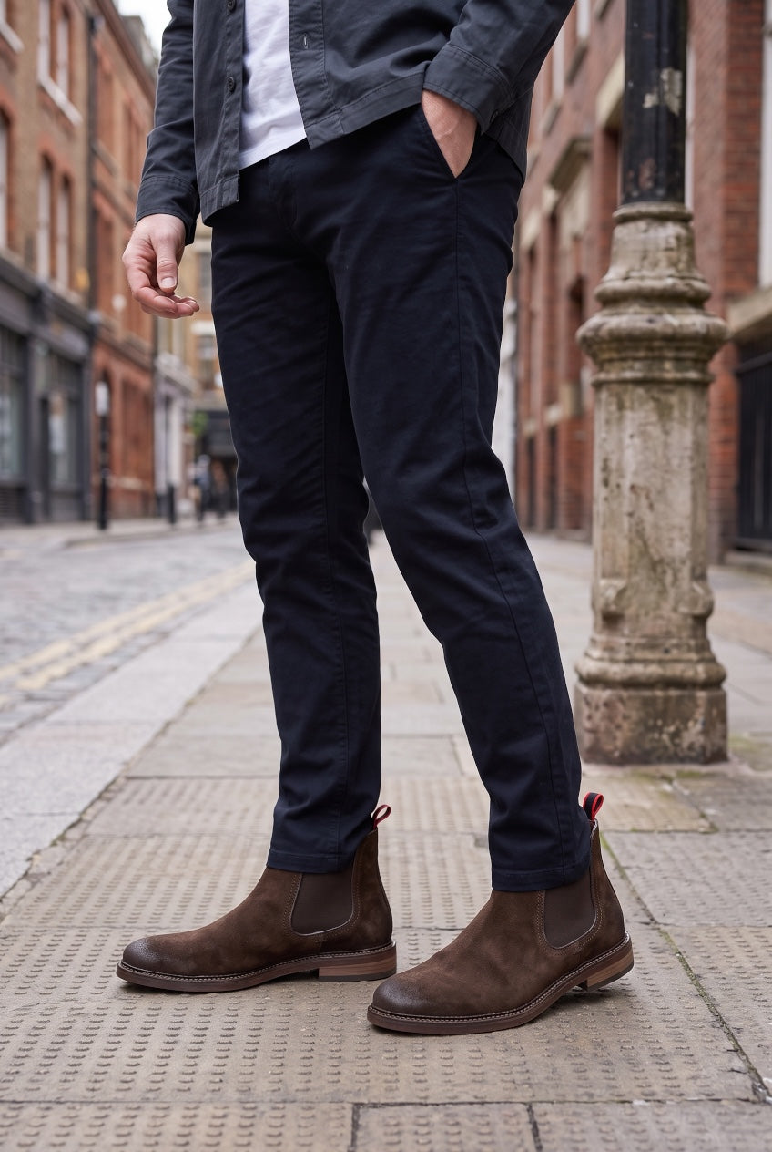 Dark brown ankle Chelsea boots with elastic side gores and cushioned pull-on fit