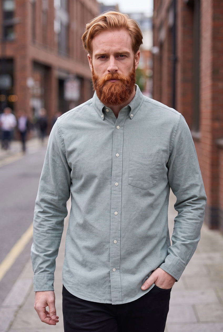 Brushed Oxford button-up shirt in light green with long sleeves and button front