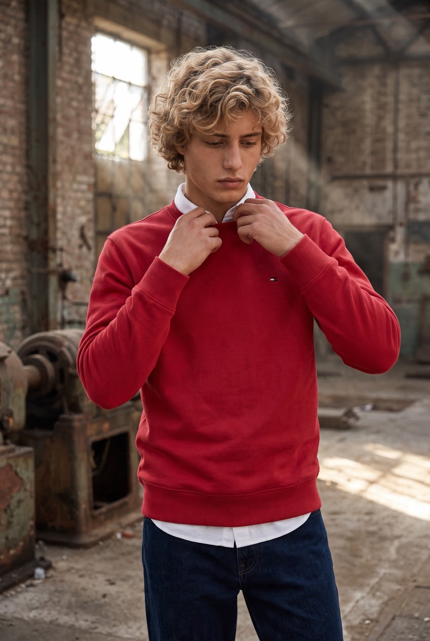 Tommy Jeans red crewneck sweatshirt with long sleeves and a small chest flag logo